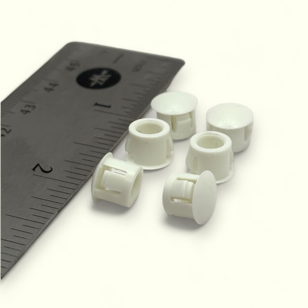 Fits 5/16" Hole - 5/16" Diameter - 5/16" Height -up to 1/16" Panel Thickness - Nylon Caps Locking Panel Plugs